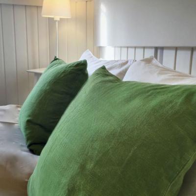 Chambre hambourg coussins verts